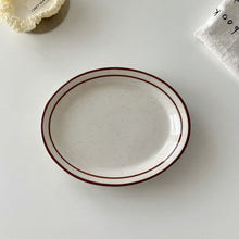 画像をギャラリービューアに読み込む, brown oval dish.
